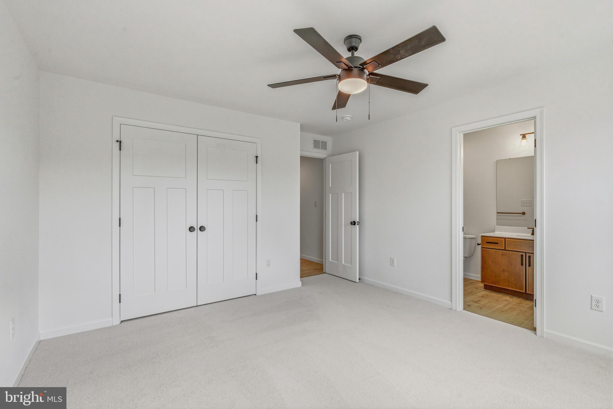 1050 Glen Hall Road Kennett Square, PA 19348 - Photo 29 of 42 a view of a livingroom with a ceiling fan & a ceiling fan