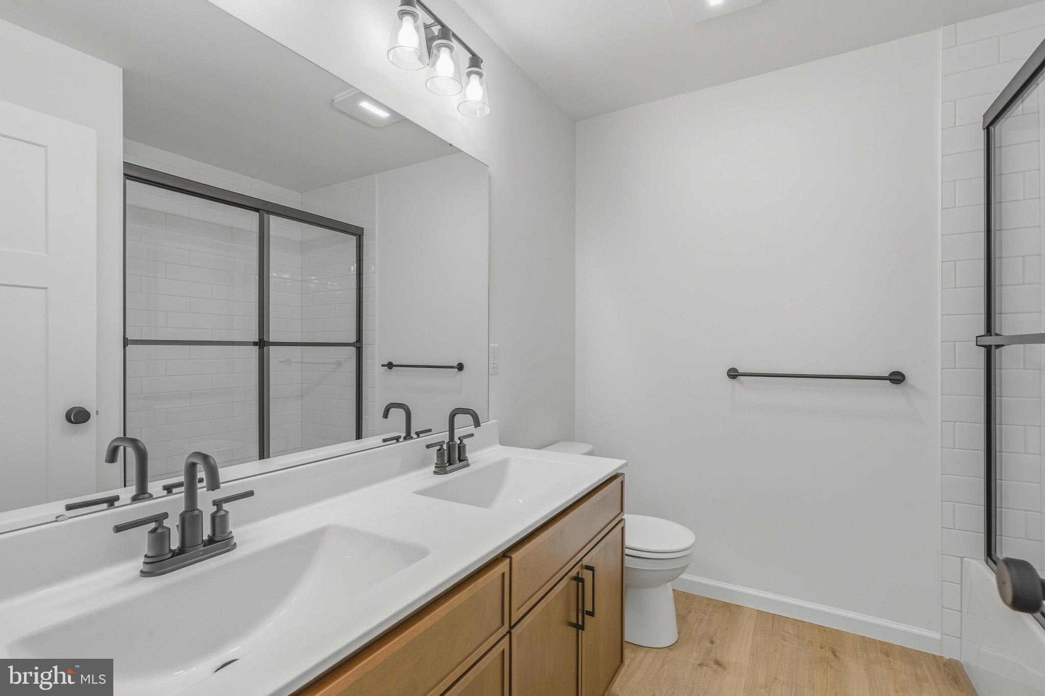 1050 Glen Hall Road Kennett Square, PA 19348 - Photo 30 of 42 a bathroom with a sink a toilet and shower