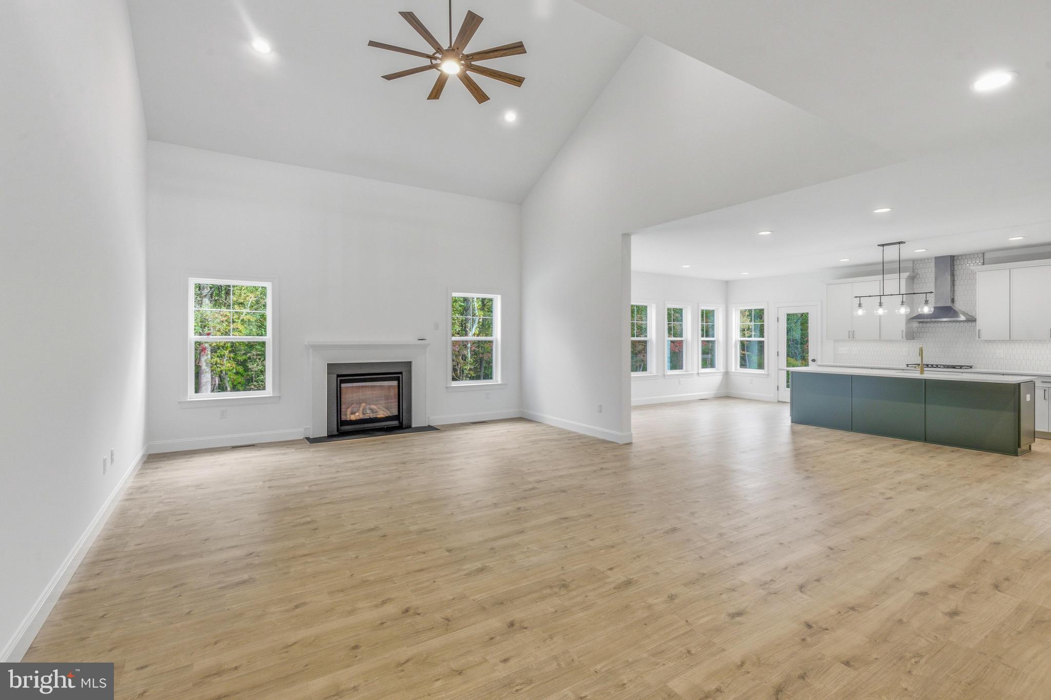 1050 Glen Hall Road Kennett Square, PA 19348 - Photo 7 of 42 a view of a kitchen with a sink and a fireplace
