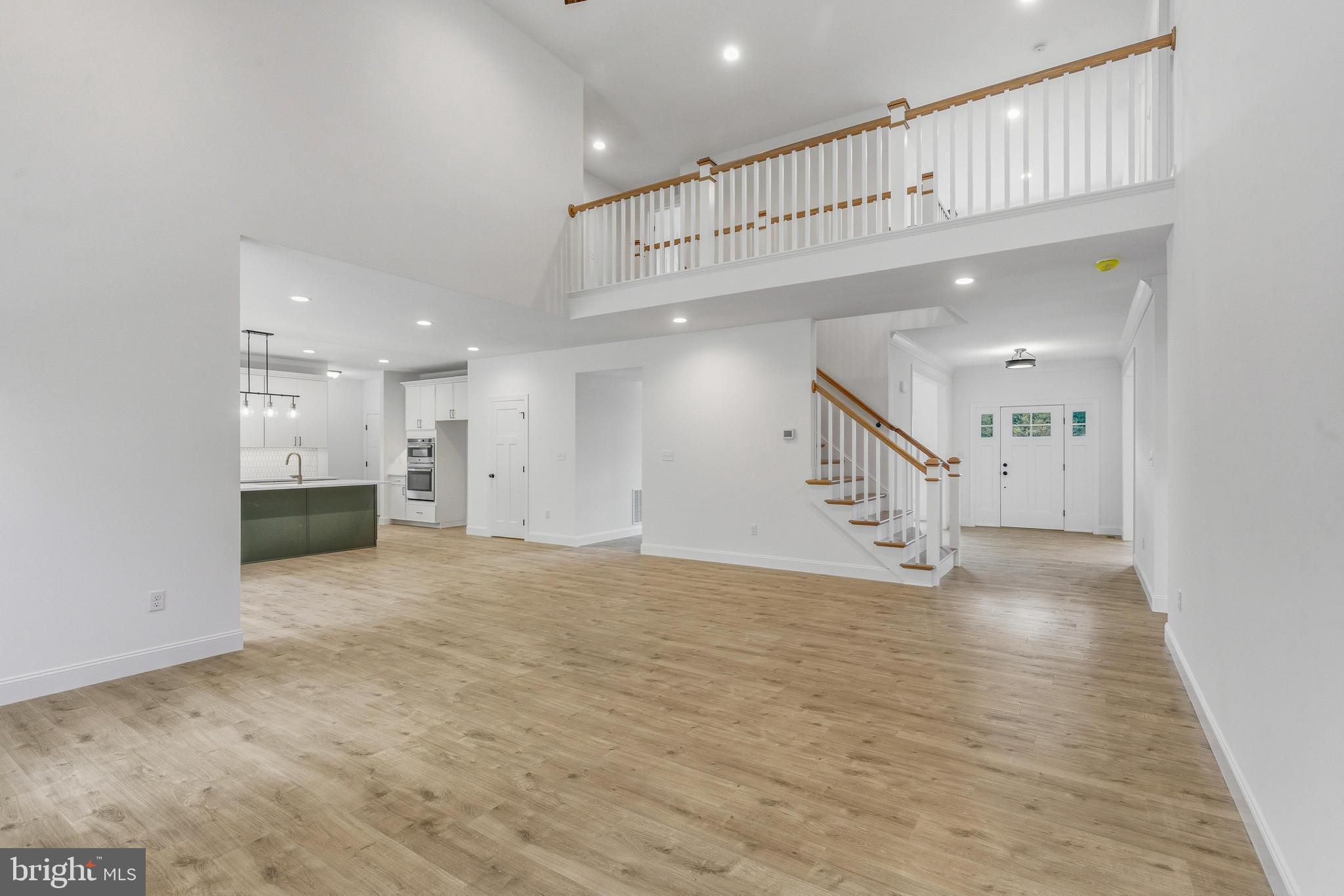 1050 Glen Hall Road Kennett Square, PA 19348 - Photo 8 of 42 a view of an empty room with wooden floor