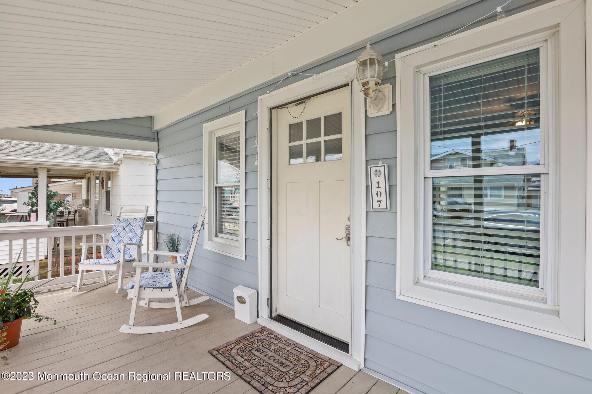 107 17th Avenue Belmar, NJ 07719 - Photo 5 of 32 a view of a dining room with a table and chairs
