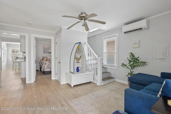a view of living room filled with furniture