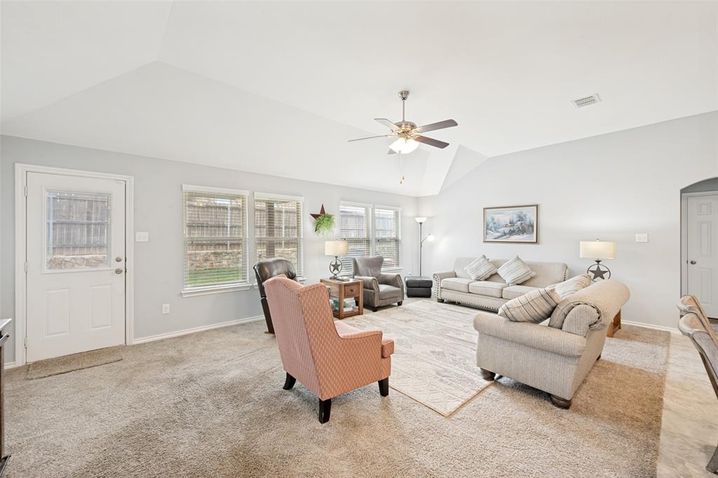 3905 Bridle Path Lane Sanger, TX 76266 - Photo 12 of 26 a living room with furniture and a large window