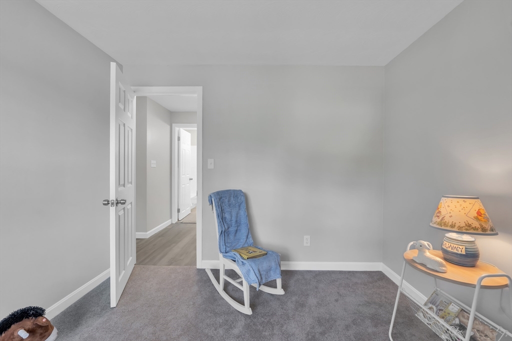33 Ruthellen Road Framingham, MA 01701 - Photo 23 of 42 a room with furniture and a window