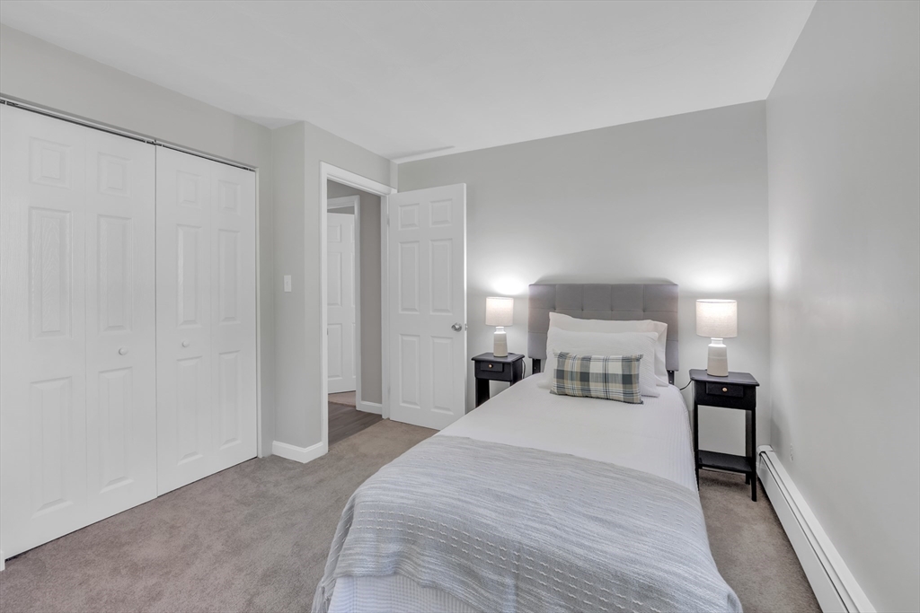 33 Ruthellen Road Framingham, MA 01701 - Photo 26 of 42 a large white bed in a white room