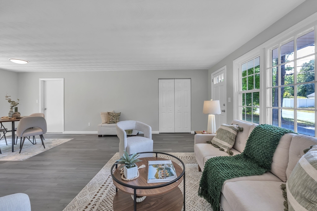 33 Ruthellen Road Framingham, MA 01701 - Photo 3 of 42 a living room with furniture a window and a table