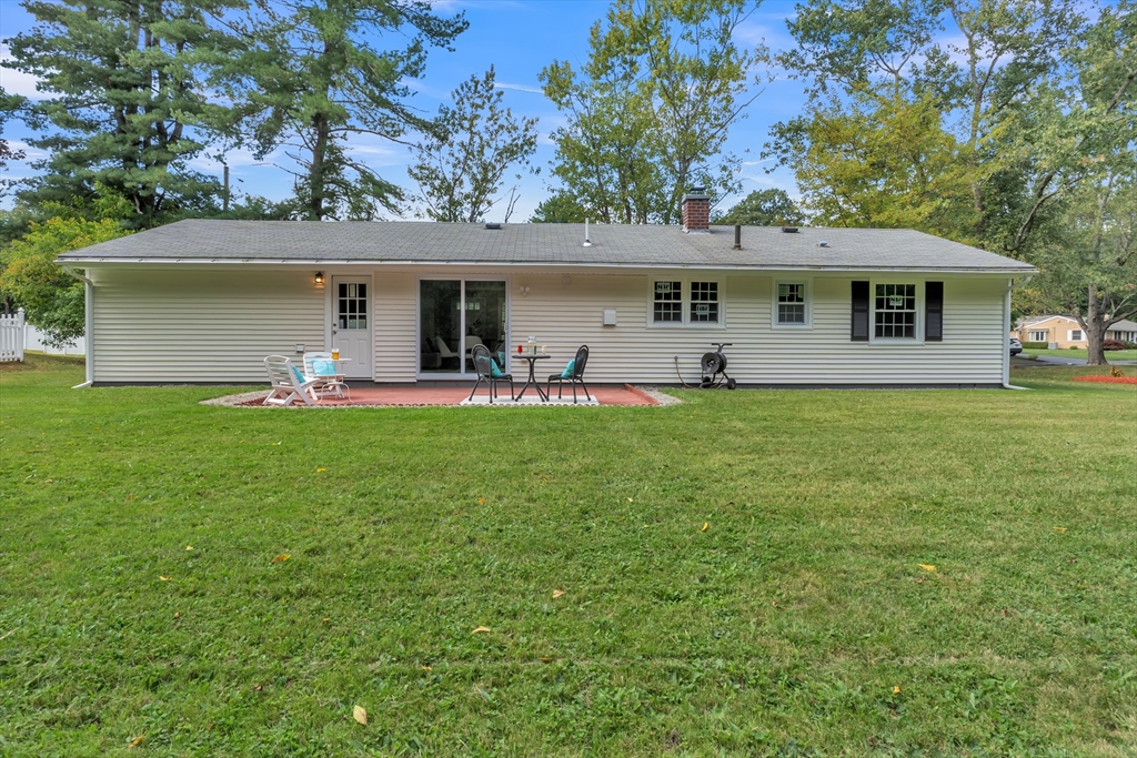 33 Ruthellen Road Framingham, MA 01701 - Photo 40 of 42 a front view of a house with a yard and trees