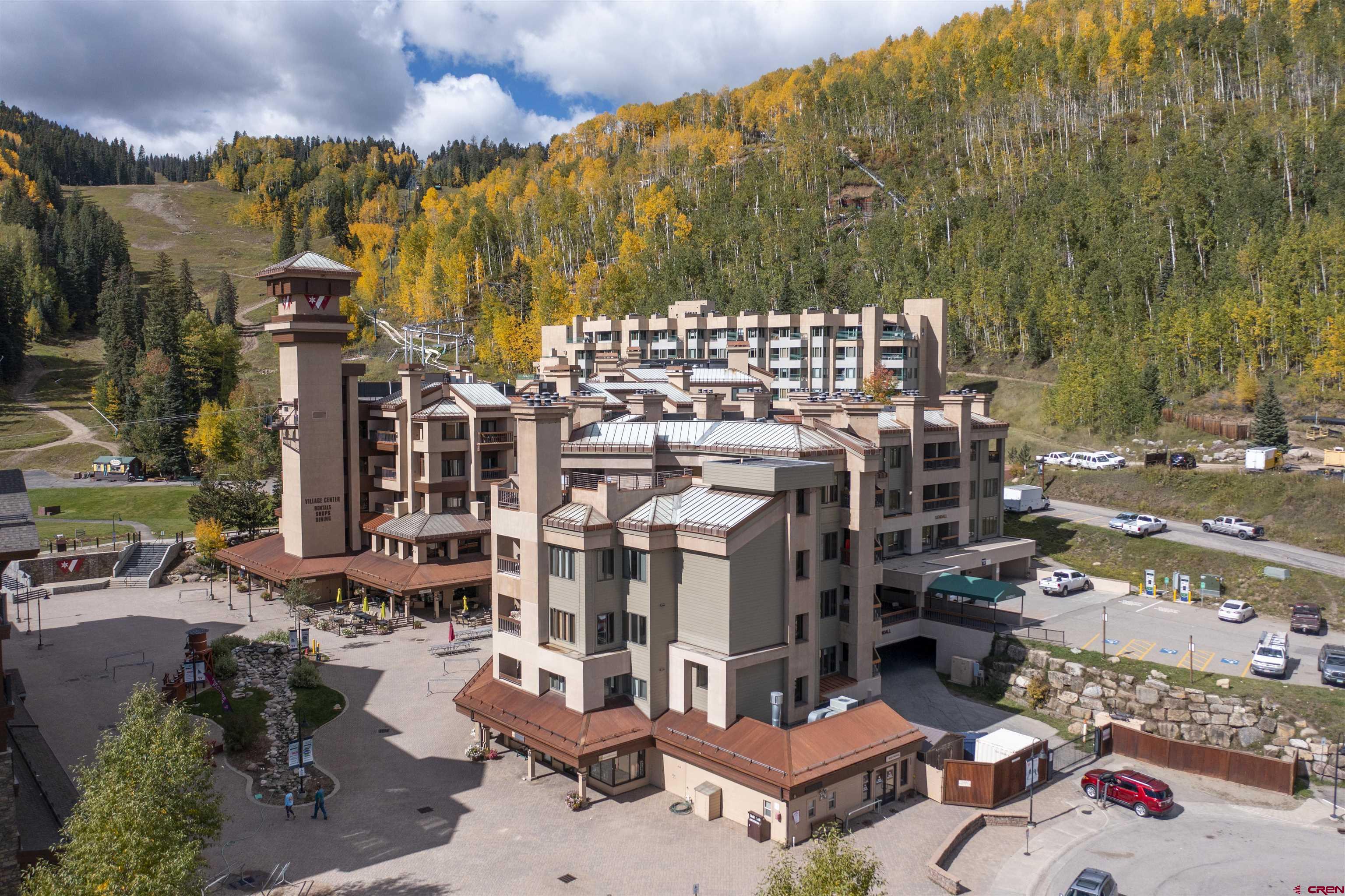 71 Needles Way, Unit 347 Durango, CO 81301 - Photo 8 of 31 a city street filled with lots of traffic and trees