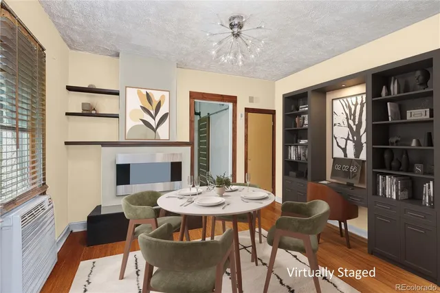 a kitchen with stainless steel appliances a sink stove and cabinets