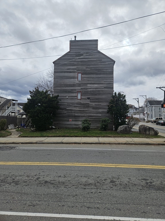 490 School Street, Unit 2 Lowell, MA 01851 - Photo 2 of 26 a view of a brick building