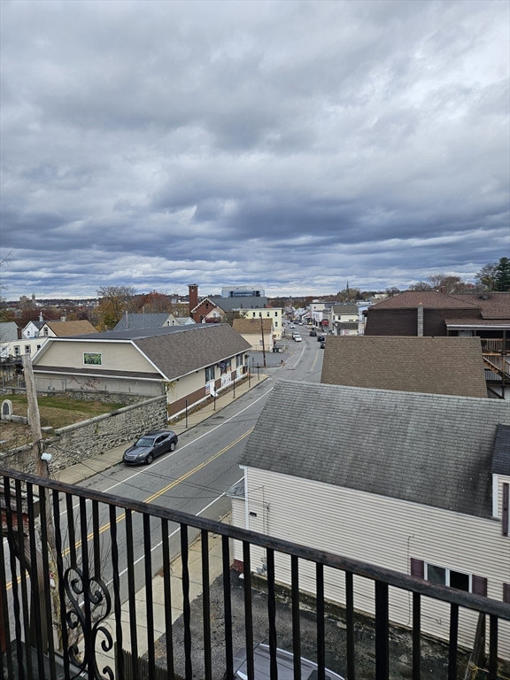 490 School Street, Unit 2 Lowell, MA 01851 - Photo 24 of 26 a view of a city from the balcony