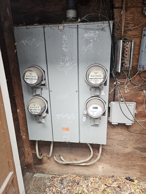 490 School Street, Unit 2 Lowell, MA 01851 - Photo 4 of 26 a bathroom with a toilet and a shower curtain