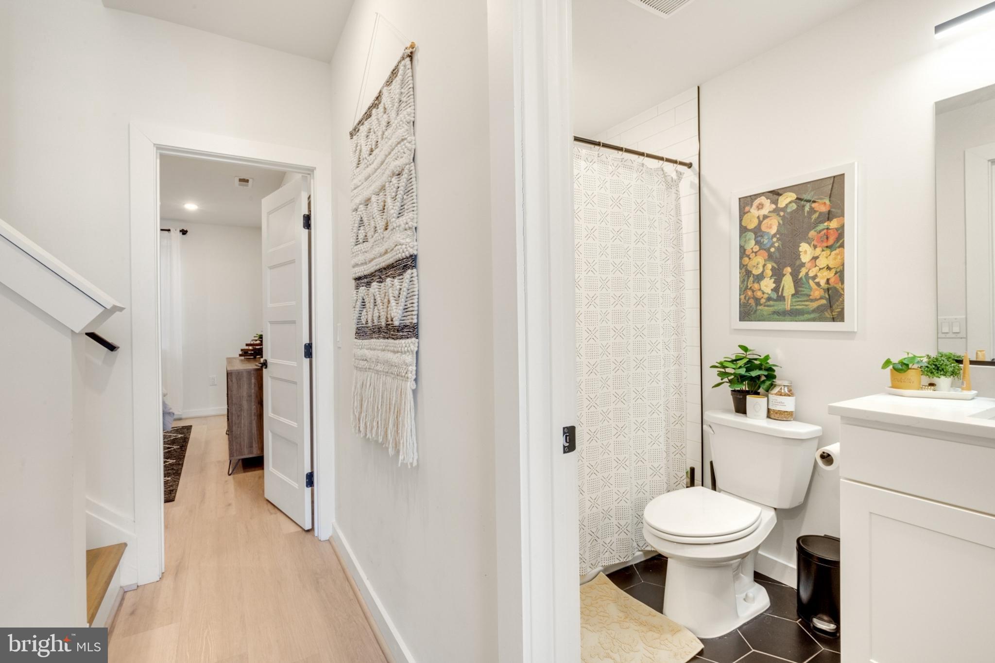 2212 North Front Street, Unit 5 Philadelphia, PA 19133 - Photo 10 of 25 a bathroom with a toilet and a shower