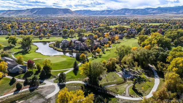 a view of a city with mountains in the background