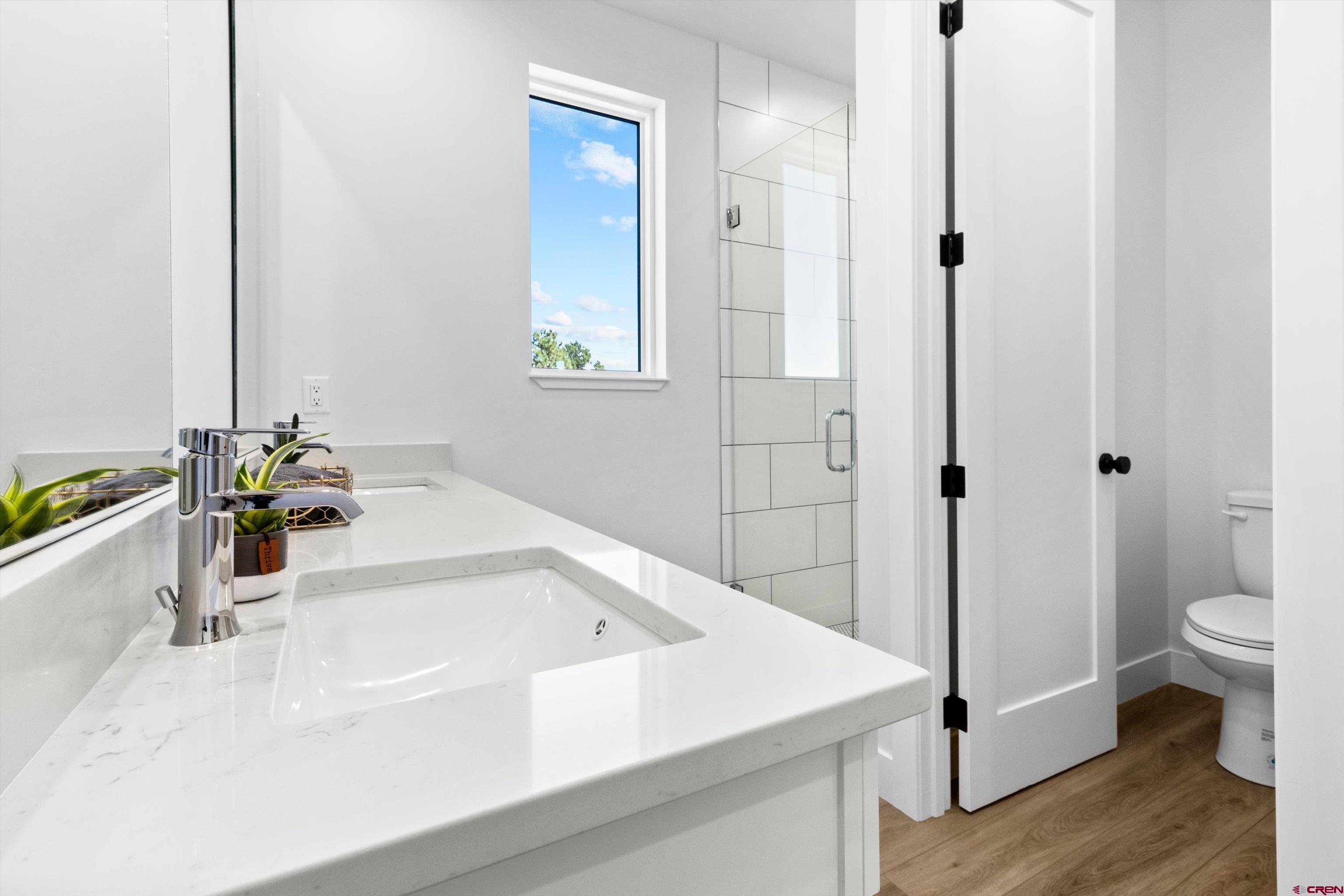 111 Elevation Drive Durango, CO 81303 - Photo 20 of 33 a bathroom with a sink and a bathtub