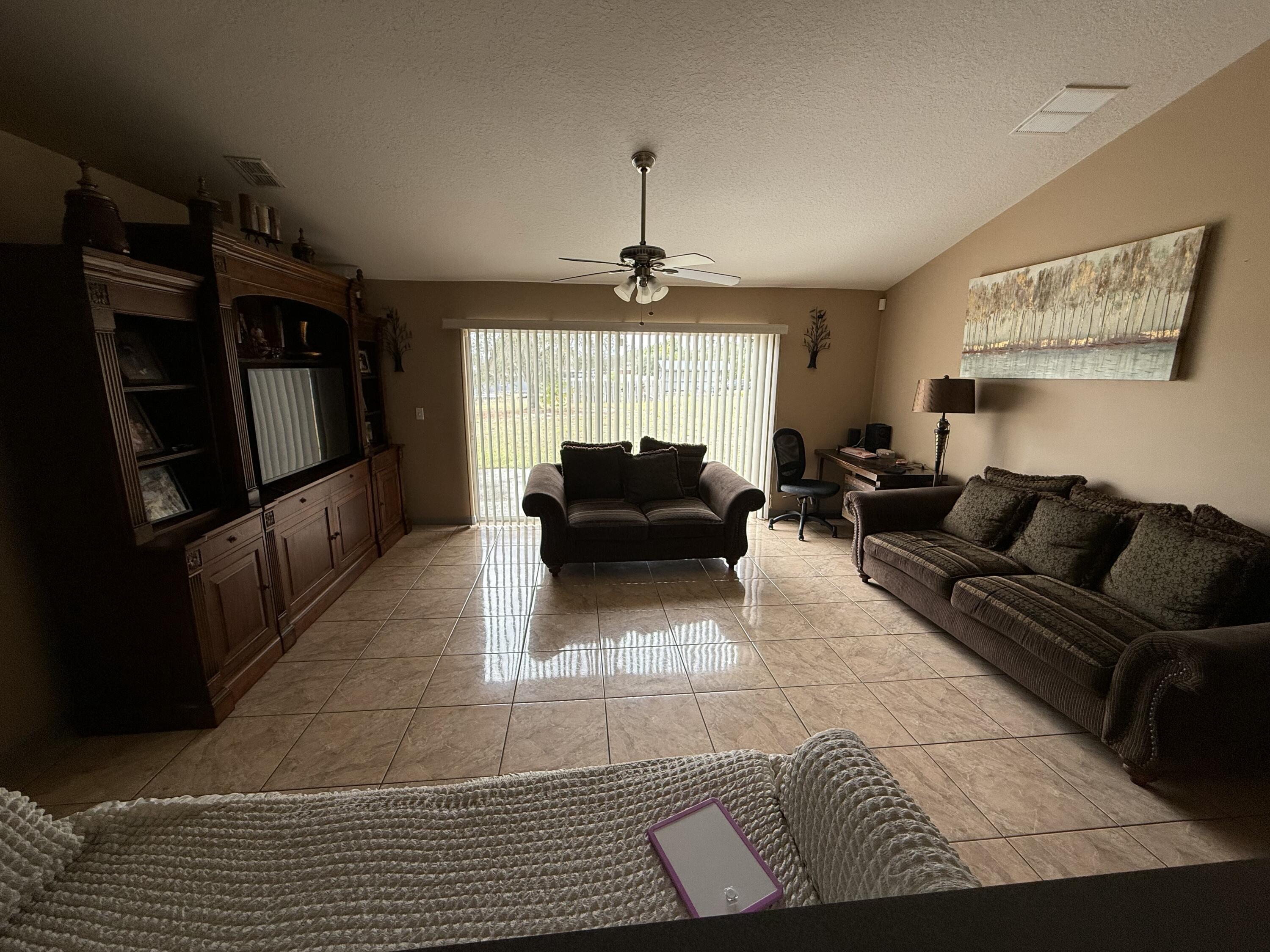4010 Watkins Road Haines City, FL 33844 - Photo 8 of 8 a living room with furniture