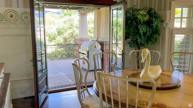 426 West Center Street Parowan, UT 84761 - Photo 10 of 107 Dining area with rich wood-finish flooring and a direct opening to an outdoor patio