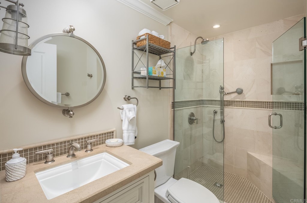 510 4th Street, Unit 3C Encinitas, CA 92024 - Photo 21 of 30 a bathroom with a sink toilet and shower