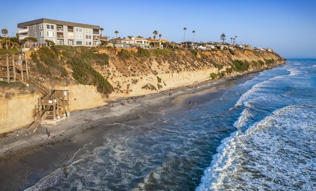 510 4th Street, Unit 3C Encinitas, CA 92024 - Photo 28 of 30 a view of ocean with a building in the background
