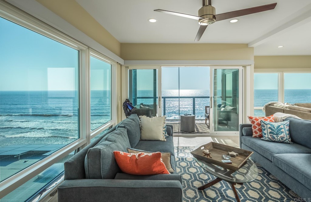 510 4th Street, Unit 3C Encinitas, CA 92024 - Photo 3 of 30 a living room with furniture and a large window