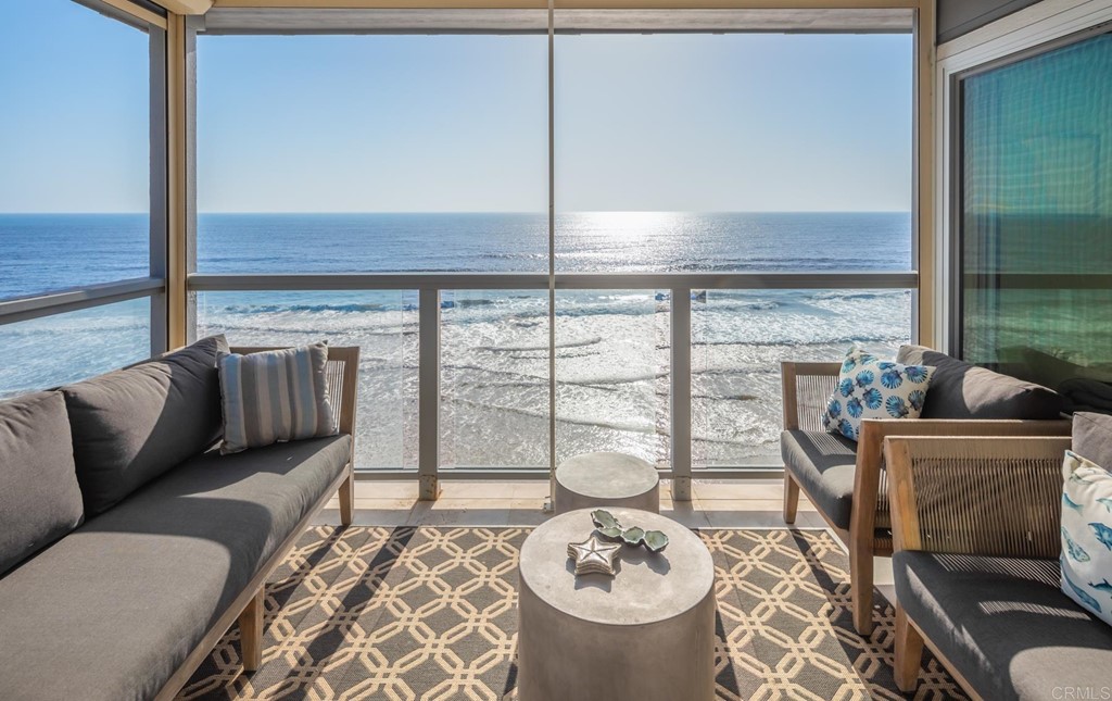 510 4th Street, Unit 3C Encinitas, CA 92024 - Photo 4 of 30 a living room with furniture and a floor to ceiling window