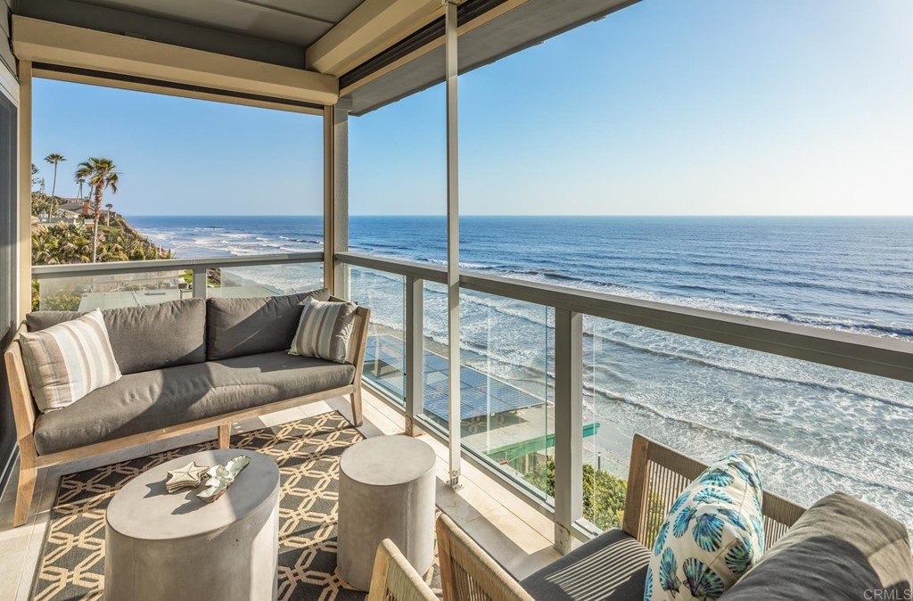 510 4th Street, Unit 3C Encinitas, CA 92024 - Photo 10 of 30 a living room with furniture and a large window
