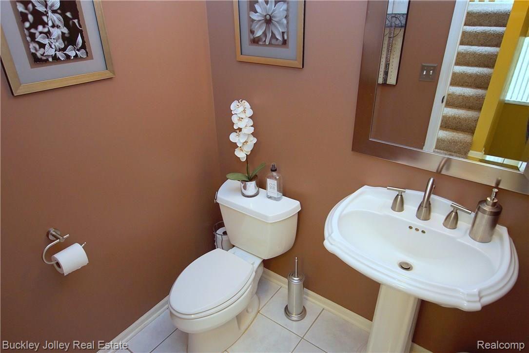 9490 Quail Ridge Run Brighton, MI 48114 - Photo 15 of 27 Main Entry Half Bathroom.JPG