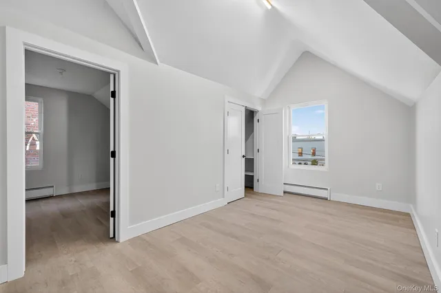 a kitchen with stainless steel appliances a refrigerator sink and stove