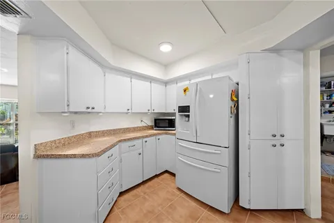 $895,000 | 813 105th Avenue North, Naples, FL 34108