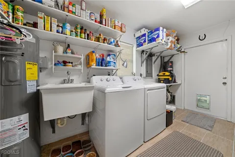 $895,000 | 813 105th Avenue North, Naples, FL 34108