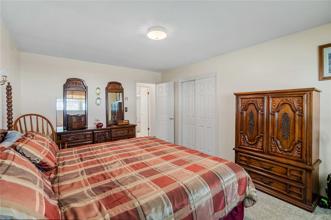 312 Edwards Drive Anderson, SC 29626 - Photo 20 of 44 An inviting bedroom with plush carpeting features ample closet space and a functional layout.