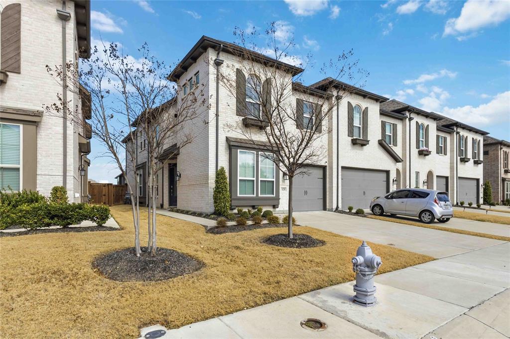 1128 Queensdown Way Forney, TX 75126 - Photo 4 of 25 a front view of a building with street view