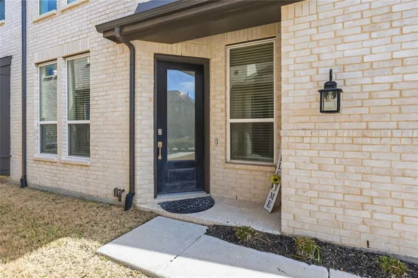 a view of a entryway door front of house