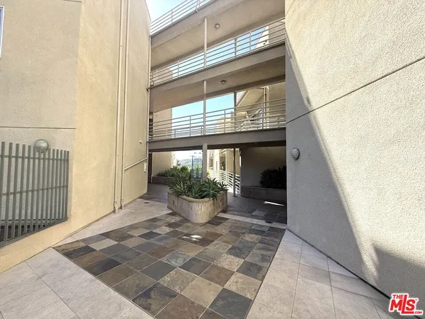 a view of living room and balcony