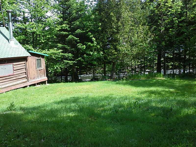 31 Hatchery Road Rangeley, ME 04964 - Photo 12 of 35 Exterior Side View. side yard is...