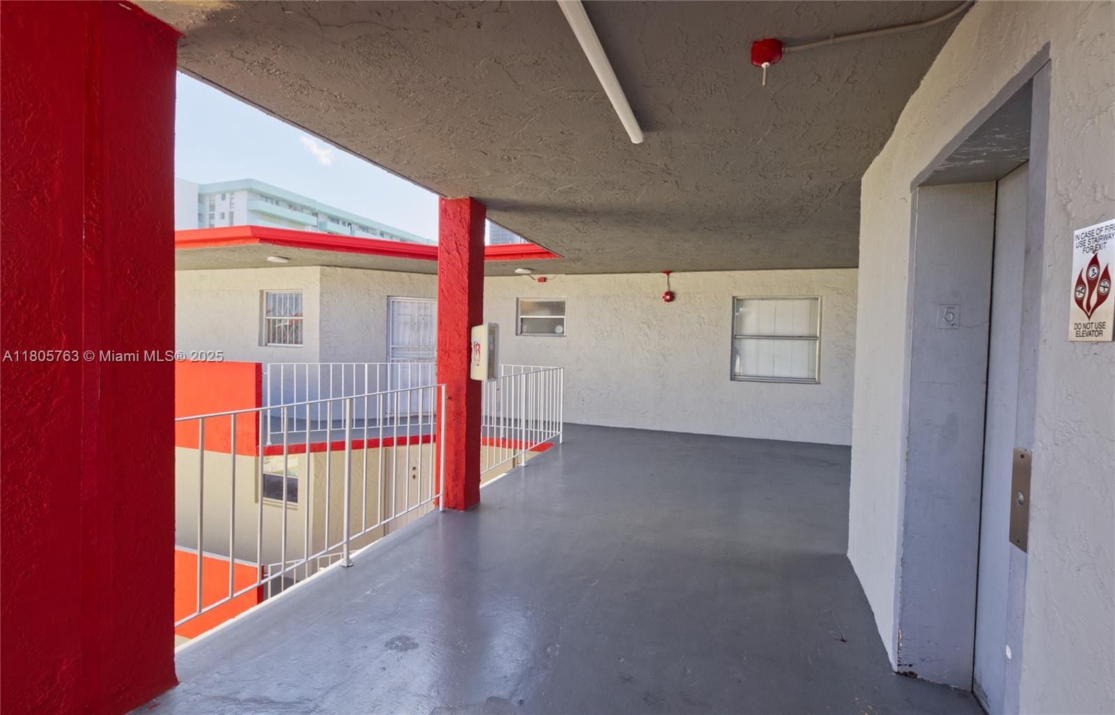 1750 West 46th Street, Unit 503 Hialeah, FL 33012 - Photo 21 of 24 a view of a hallway with entryway