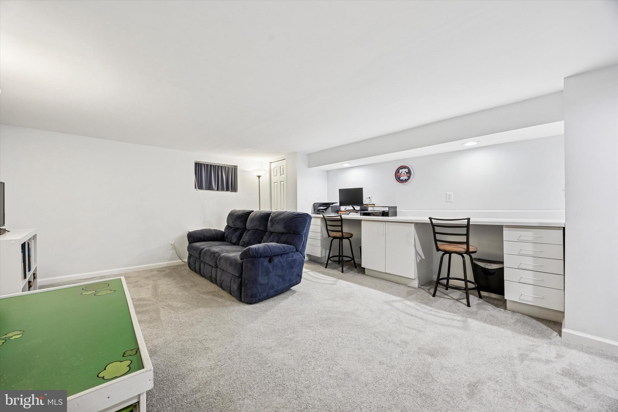 22 Mansfield Road Lansdowne, PA 19050 - Photo 20 of 25 a living room with furniture and a table