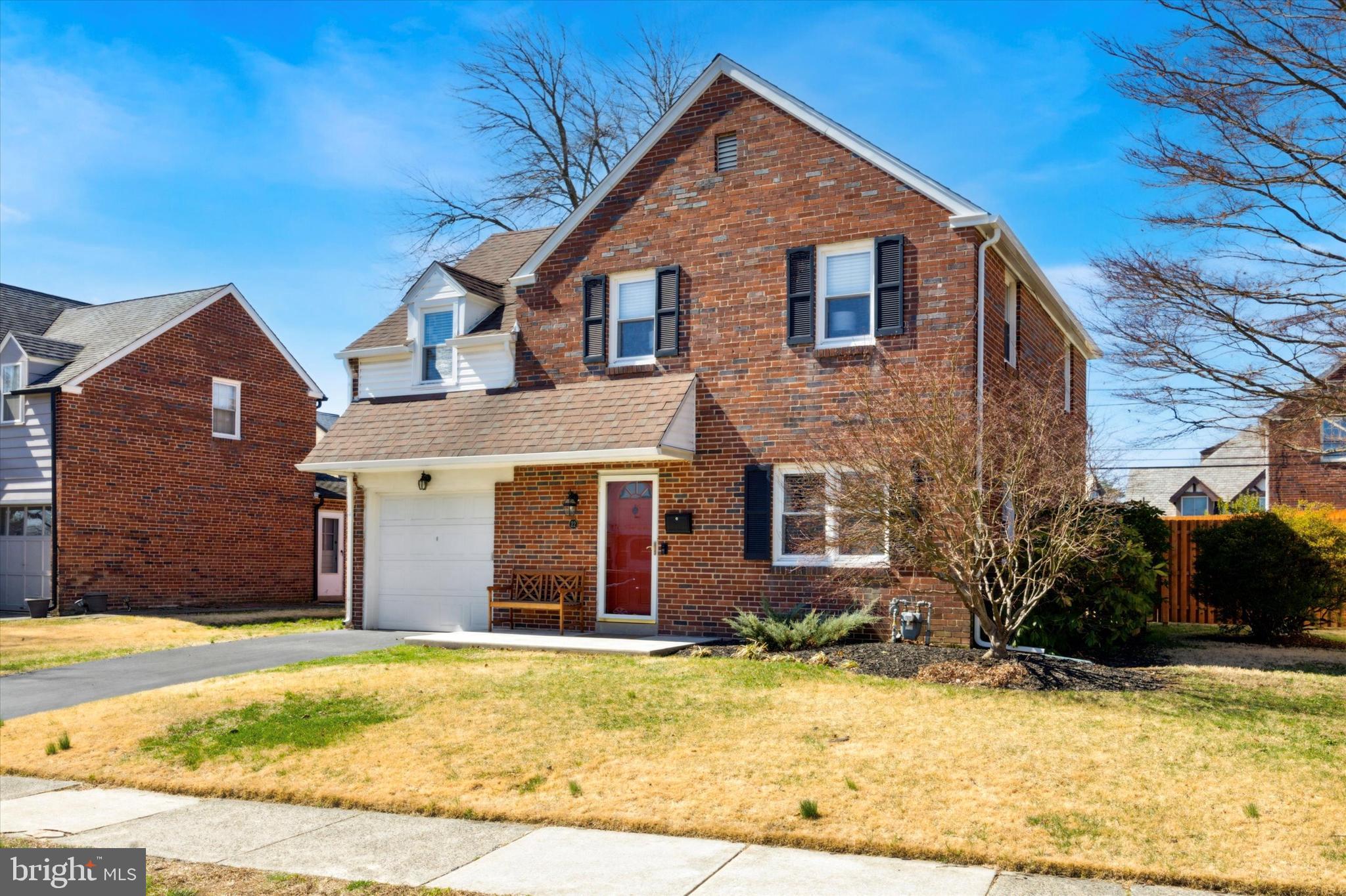 22 Mansfield Road Lansdowne, PA 19050 - Photo 2 of 25 a front view of a house with a yard