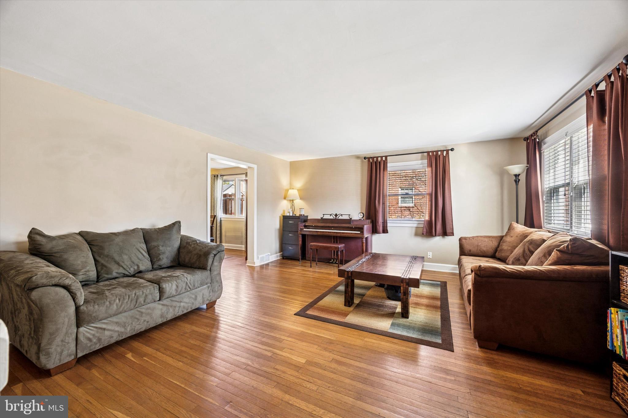 22 Mansfield Road Lansdowne, PA 19050 - Photo 3 of 25 a living room with furniture and a large window