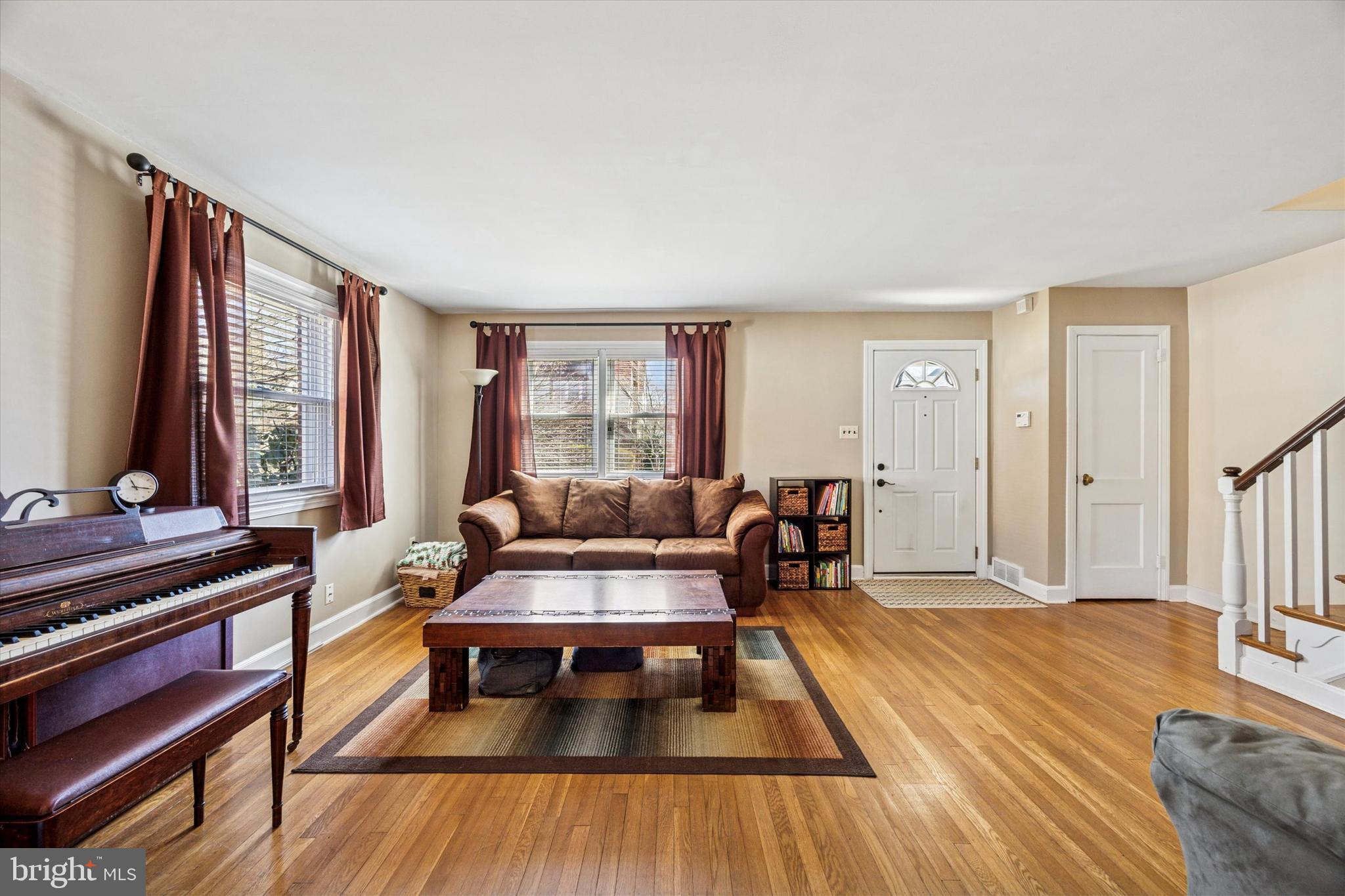 22 Mansfield Road Lansdowne, PA 19050 - Photo 5 of 25 a living room with furniture and a wooden floor