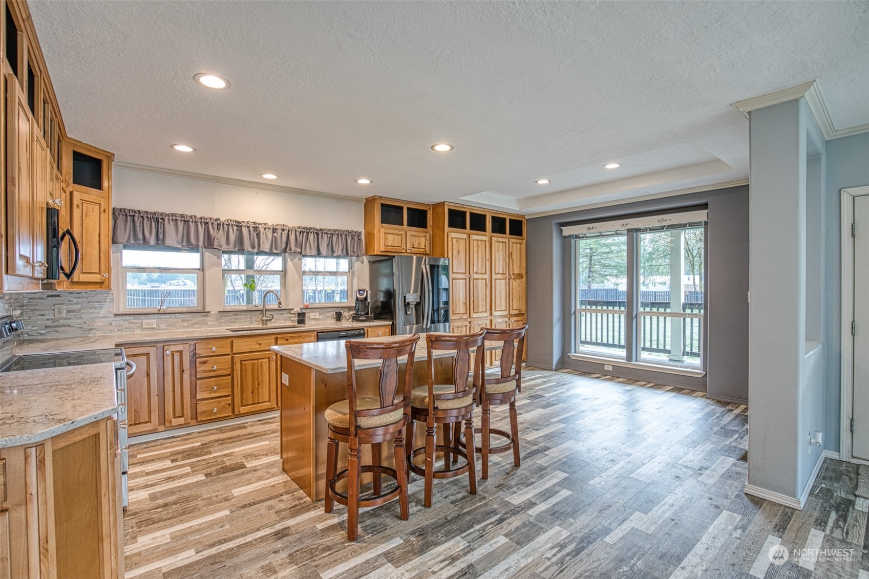 123 South Union Road Elma, WA 98541 - Photo 11 of 30 a view of a dining room with furniture window and wooden floor