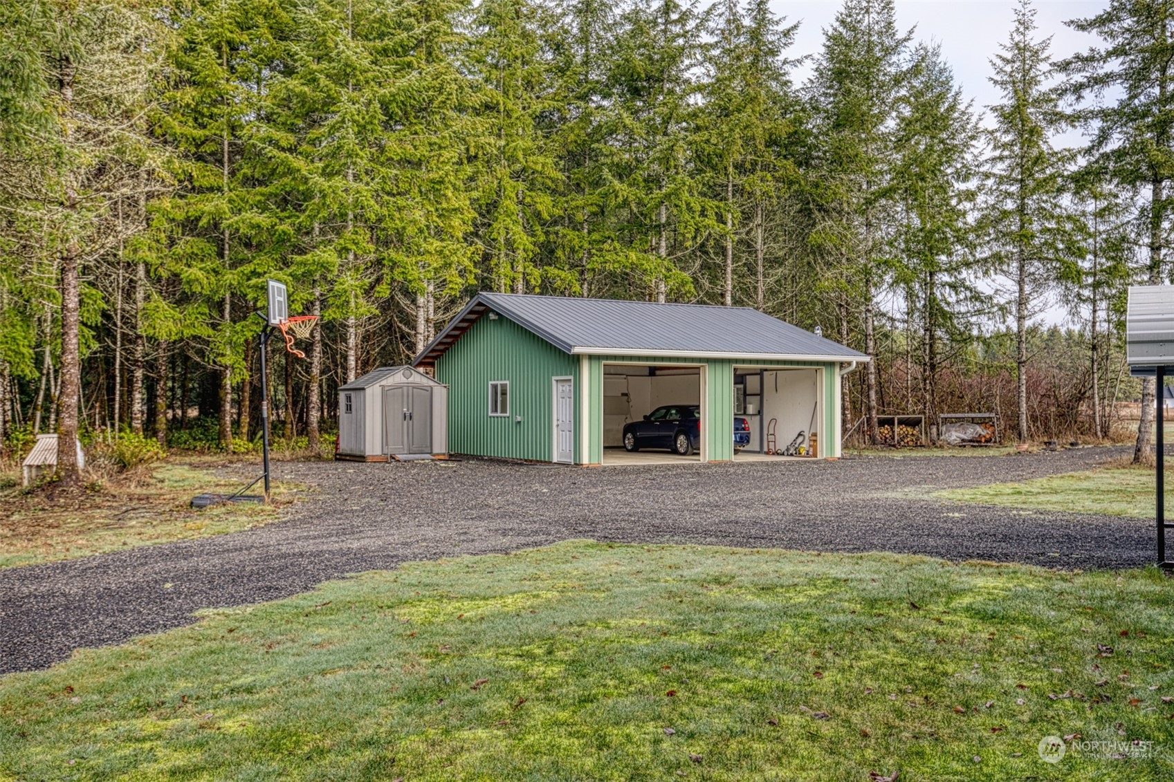 123 South Union Road Elma, WA 98541 - Photo 20 of 30 a front view of house with yard and trees