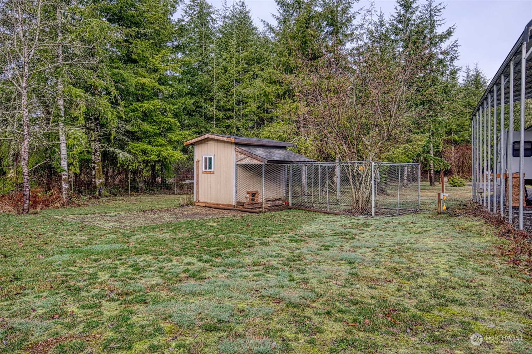 123 South Union Road Elma, WA 98541 - Photo 26 of 30 a house with green field in front of it