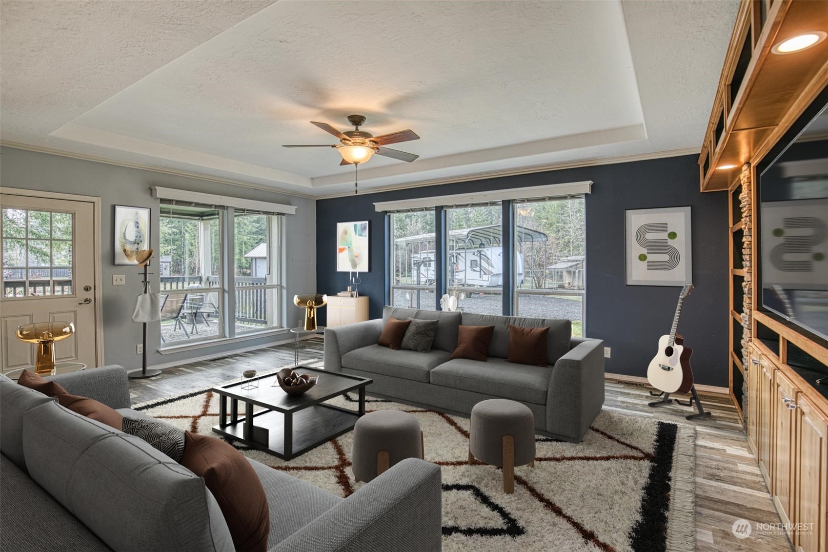 123 South Union Road Elma, WA 98541 - Photo 5 of 30 a living room with furniture and a flat screen tv