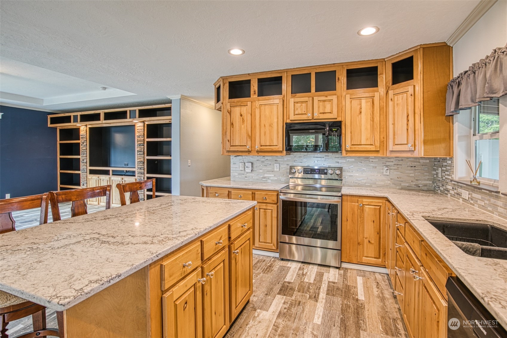 123 South Union Road Elma, WA 98541 - Photo 8 of 30 a kitchen with stainless steel appliances granite countertop a stove and a sink