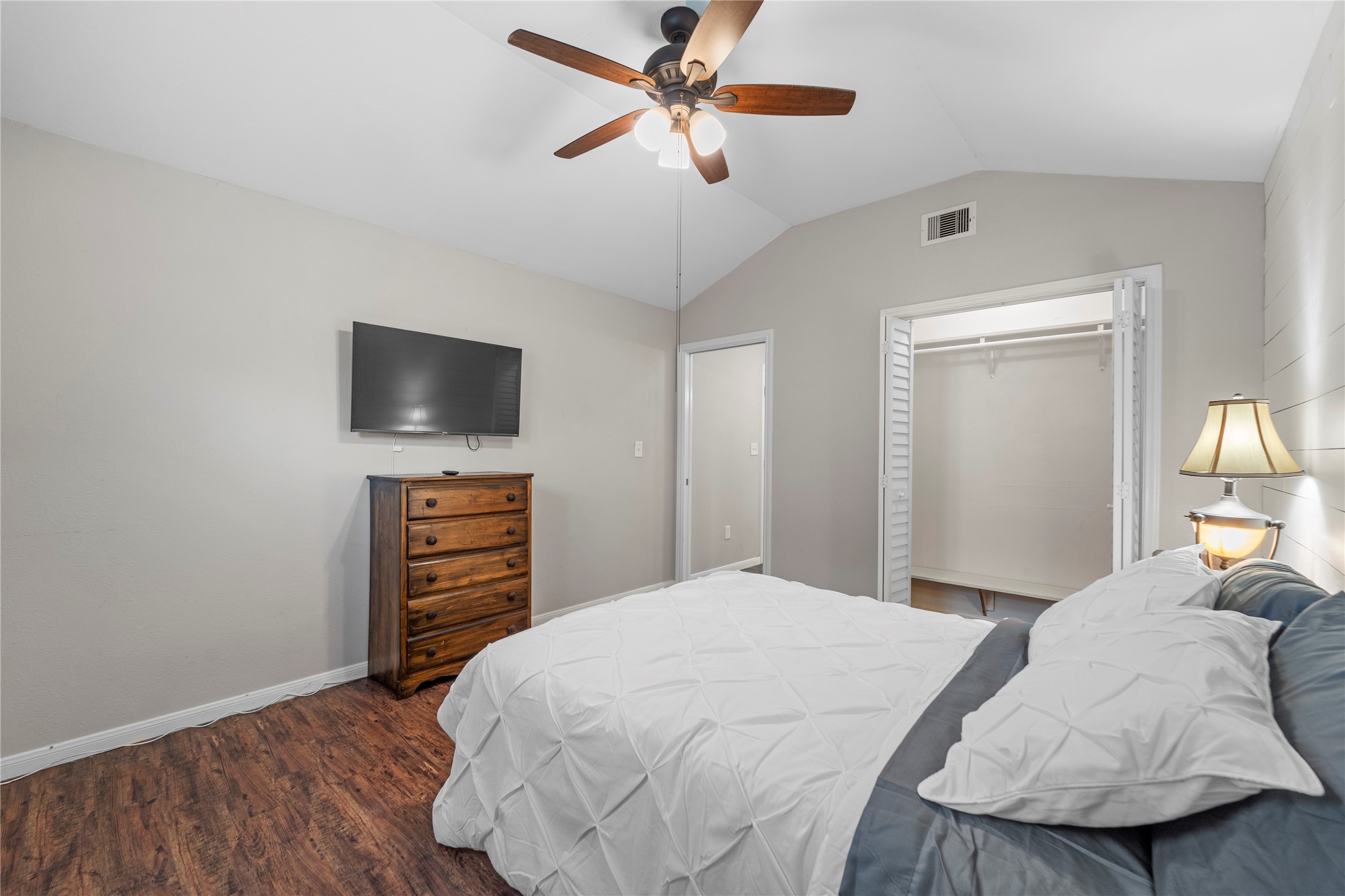 6951 Leandra Drive Houston, TX 77083 - Photo 5 of 12 a bedroom with a bed and a flat screen tv