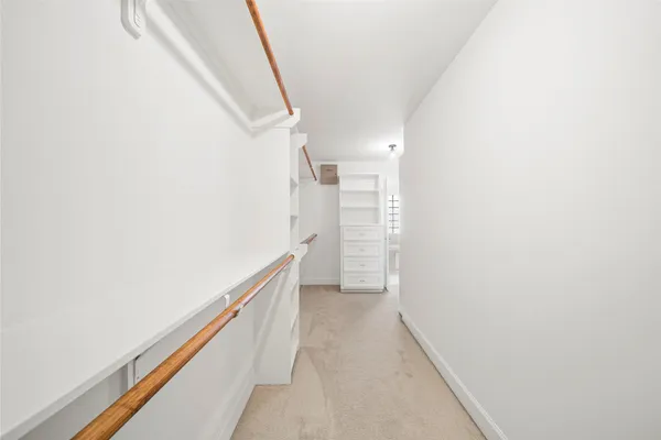 a view of hallway with stairs