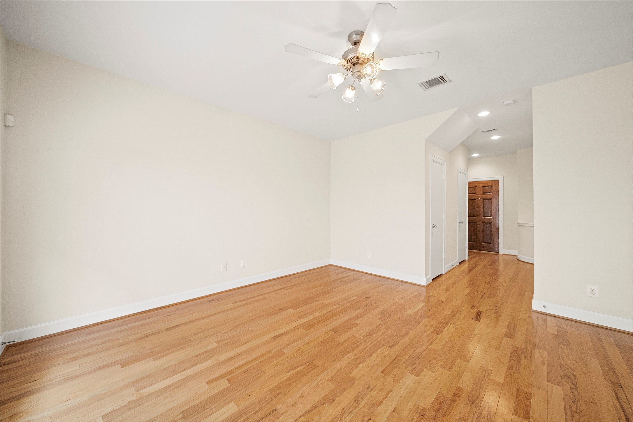 3726 Main Poplar Drive Houston, TX 77025 - Photo 2 of 25 a view of an empty room with wooden floor