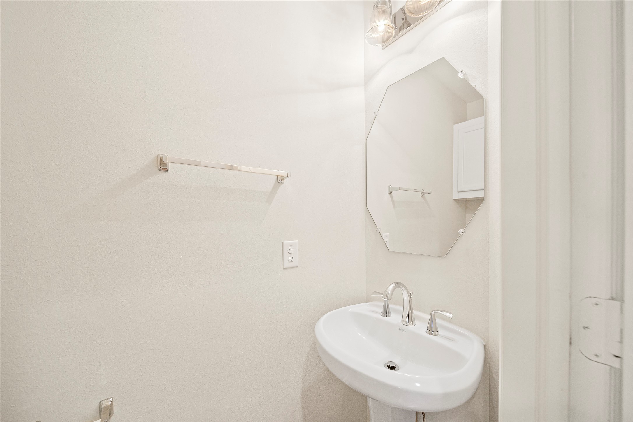 3726 Main Poplar Drive Houston, TX 77025 - Photo 21 of 25 a bathroom with a sink a mirror and a shower