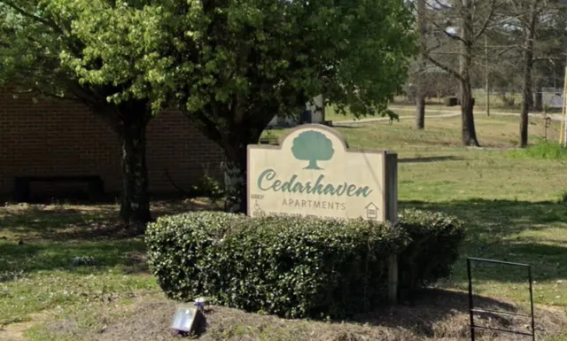 a sign on the side of the road